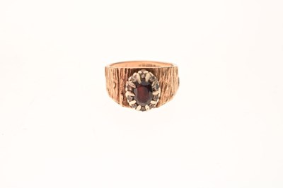 Lot 1 - 1970s 9ct gold garnet and white stone cluster ring