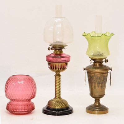 Lot 847 - Two late Victorian or Edwardian brass oil lamps