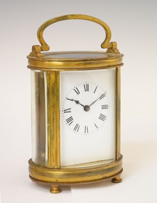 Lot 744 - French gilt metal oval carriage timepiece