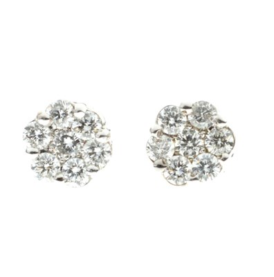 Lot 185 - Pair of seven-stone diamond 18ct white gold cluster ear studs