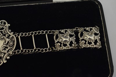 Lot 250 - Edward VII silver belt and buckle with pierced rococo decoration