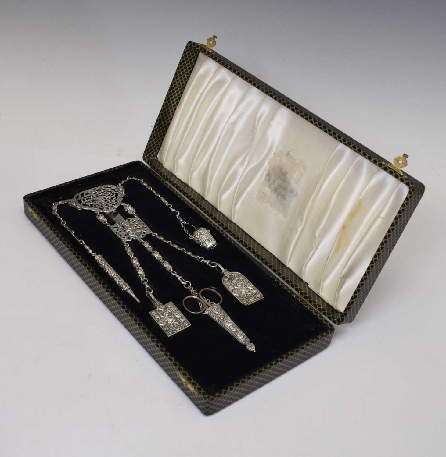 Lot 299 - Silver-plated five-branch chatelaine