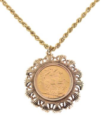 Lot 304 - George V gold sovereign, 1915, in a 9ct gold pendant mount and chain