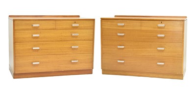 Lot 751 - Pair of teak retro chests of two short over three long graduated drawers