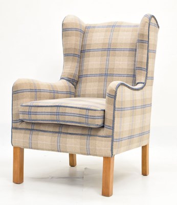 Lot 805 - Modern wingback armchair upholstered in tartan wool fabric