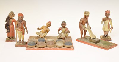 Lot 479 - Six 19th century Indian polychrome painted wooden figures