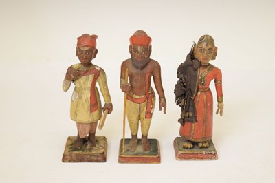 Lot 479 - Six 19th century Indian polychrome painted wooden figures