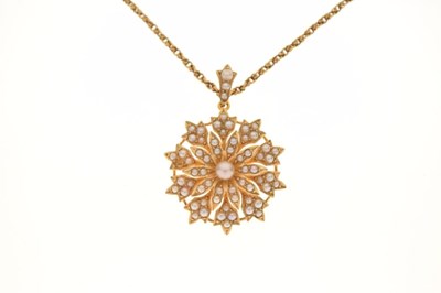 Lot 50 - Unmarked yellow metal and seed pearl 'snowflake' pendant