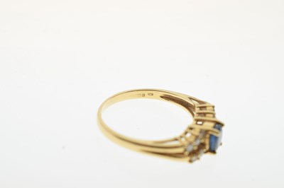 Lot 37 - 18c gold sapphire and white sapphire dress ring