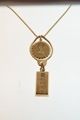 Lot 53 - Elizabeth II 9ct gold ingot pendant, 9ct St Christopher and 18ct chain