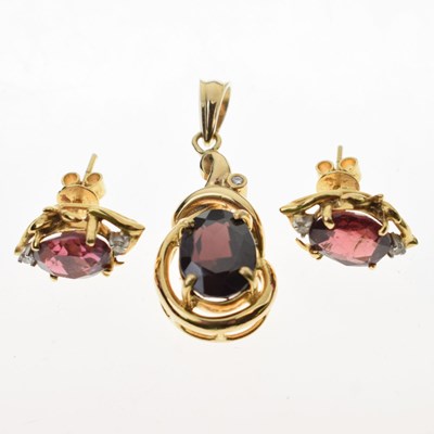 Lot 100 - Pair of garnet and diamond set stud earrings