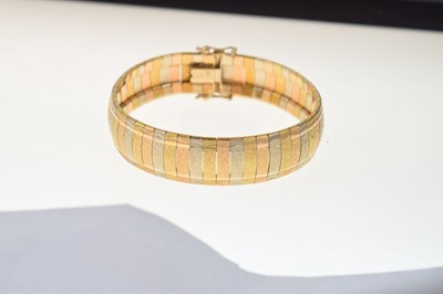 Lot 169 - Three-colour gold Italian bracelet, stamped '750'