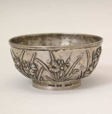 Lot 279 - Late 19th/early 20th century Chinese export white-metal bowl of circular form decorated with iris