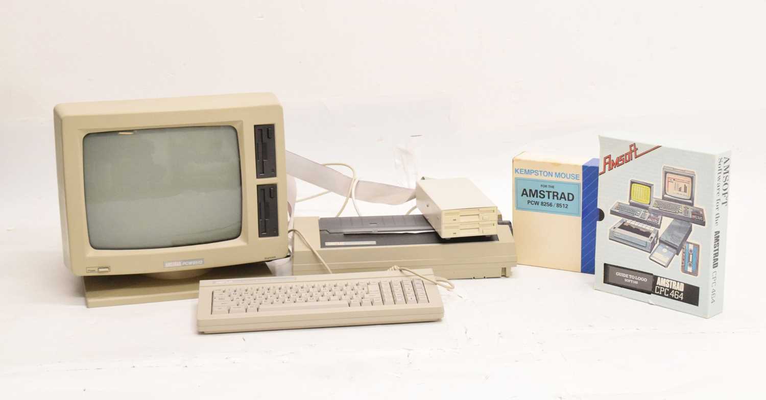 Lot 333 - Amstrad PCW8512 computer and accessories