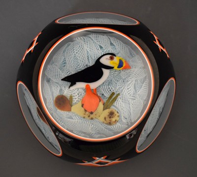 Lot 398 - John Deacons black and orange puffin paperweight