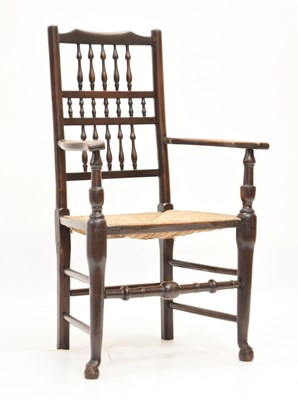 Lot 819 - Rush seated spindle-back country chair