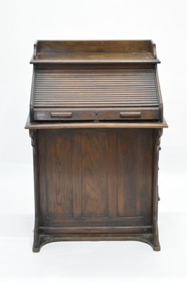 Lot 789 - Early 20th century oak roll top desk
