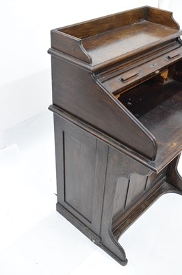 Lot 789 - Early 20th century oak roll top desk
