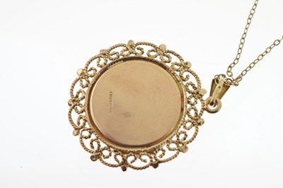 Lot 113 - 9ct gold circular locket