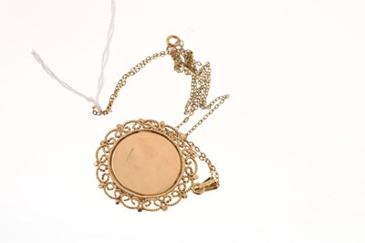 Lot 113 - 9ct gold circular locket