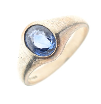 Lot 18 - Silver signet ring set a facetted oval cut sapphire