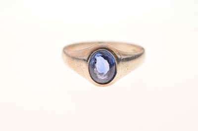 Lot 44 - Silver signet ring set a facetted oval cut sapphire