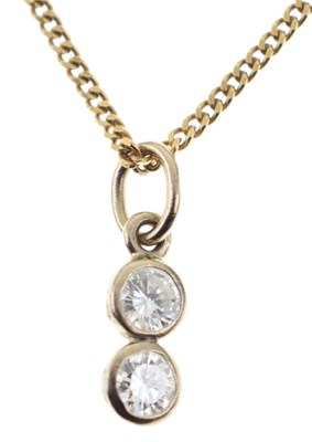 Lot 106 - Two-stone diamond pendant