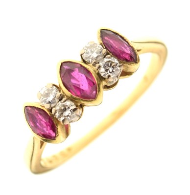 Lot 7 - Yellow metal, ruby and diamond seven-stone ring