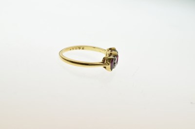 Lot 7 - Yellow metal, ruby and diamond seven-stone ring
