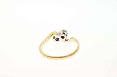 Lot 27 - 18ct gold two-stone diamond ring