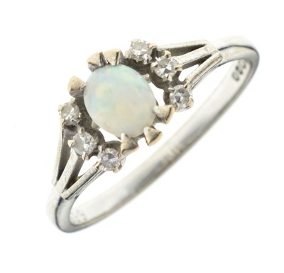 Lot 29 - 18ct white gold, opal and diamond dress ring