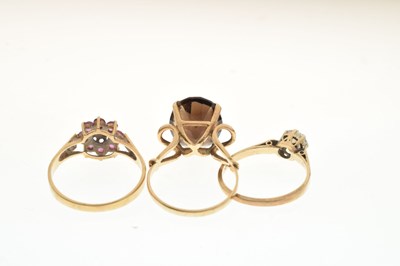 Lot 74 - Three 9ct gold stone set dress rings