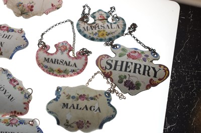Lot 298 - Collection of seventeen mid 18th century and later enamel wine and spirit decanter labels