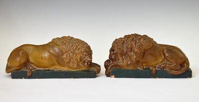 Lot 295 - Pair of late 19th century painted terracotta 'Chatsworth Lions'