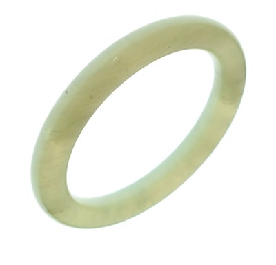 Lot 447 - Chinese celadon jade bangle