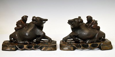 Lot 452 - Pair of Chinese boy and buffalo figure groups