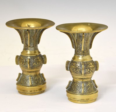 Lot 449 - Pair of Chinese bronze Gu vases