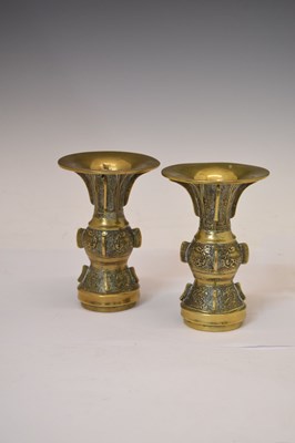 Lot 449 - Pair of Chinese bronze Gu vases