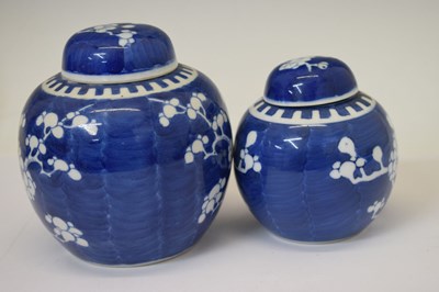 Lot 442 - Graduated set of four prunus vases and covers