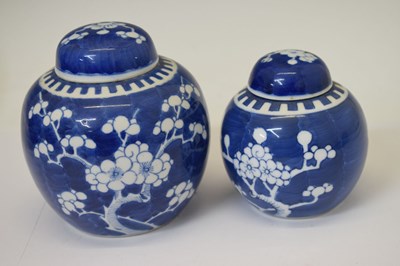 Lot 442 - Graduated set of four prunus vases and covers