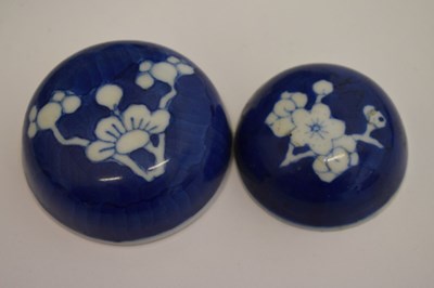 Lot 442 - Graduated set of four prunus vases and covers