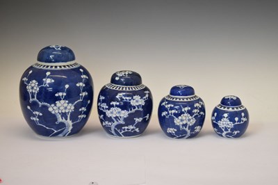 Lot 442 - Graduated set of four prunus vases and covers