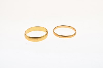 Lot 30 - Two 22ct gold wedding bands