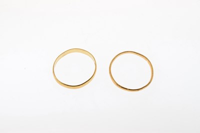 Lot 30 - Two 22ct gold wedding bands