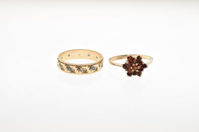 Lot 24 - Two 9ct gold stone set rings