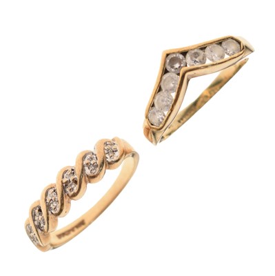 Lot 31 - Two 9ct gold dress rings, each set white stones