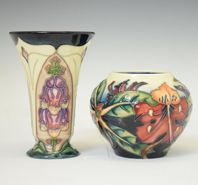 Lot 556 - Moorcroft Pottery - Foxglove and Simeon pattern vases