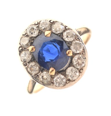 Lot 116 - Sapphire and diamond cluster ring