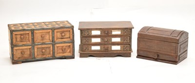 Lot 586 - Indian metal bound six-drawer table top chest