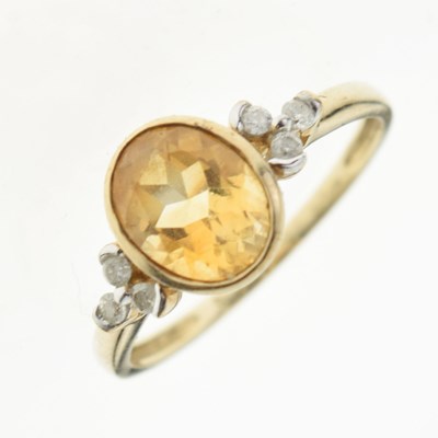 Lot 19 - 9ct gold citrine and diamond ring